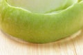 Green peeled apple closeup