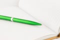 Green pen for business put on notebook Royalty Free Stock Photo