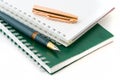 The green pen and notebook Royalty Free Stock Photo