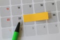 Green pen points to a Twenty-three number of calendar and have b