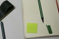 Green pencil on dotted paper to make bullet journal