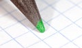 Green pencil on paper. macro Royalty Free Stock Photo