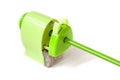 Green pencil sharpener machine on white background Royalty Free Stock Photo