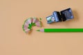 Green pencil tip shavings from sharpener Royalty Free Stock Photo