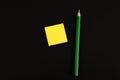 Green pencils and yellow blank sticky note paper Royalty Free Stock Photo