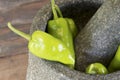 Green pepper in mortar Royalty Free Stock Photo