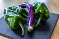 Green peppers and long eggplant Royalty Free Stock Photo