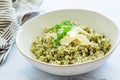 Green pesto risotto with parmisan, white background Royalty Free Stock Photo