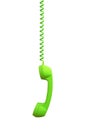 Green phone receiver hanging, isolated on white Royalty Free Stock Photo