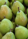 Green piled pears Royalty Free Stock Photo