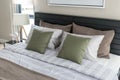 Green pillows on bed