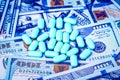 Green pills on the background of one hundred dollar bills. The concept of the expensive cost of healthcare Royalty Free Stock Photo