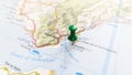 A green pin stuck in Gibraltar on a map of Spain Royalty Free Stock Photo