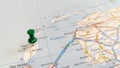 A green pin stuck in the island of Texel on a map of the Netherlands Royalty Free Stock Photo