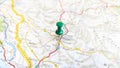 A green pin stuck in Mostar on a map of Croatia