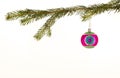 Green and Pink Christmas ornament hanging on a tree against white background Royalty Free Stock Photo