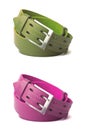 Green and pink leather belts isolated Royalty Free Stock Photo