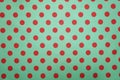 Green with pink polka dot pattern background Royalty Free Stock Photo