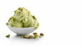 Green pistachio ice cream with nuts in white ceramic plate Royalty Free Stock Photo