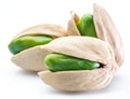 Green pistachio nuts with pistachio shell on white background. Royalty Free Stock Photo