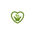 Green leaf in the love shape plant pot logo.