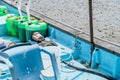 Green plastic containers of marine fuel