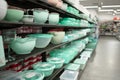Green Plastic Dishes On Store Shelf Royalty Free Stock Photo