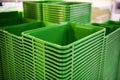Green plastic home containers tower at store Royalty Free Stock Photo