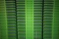 Green plastic home containers tower at store Royalty Free Stock Photo