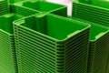 Green plastic home containers tower at store Royalty Free Stock Photo