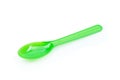 Green plastic spoon isolated on white background Royalty Free Stock Photo