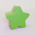 Green plastic star shape toy block on white background