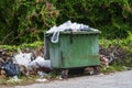 Trash Bin With Overflowing Garbage