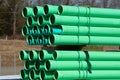 green plastic tubes on a construction site Royalty Free Stock Photo