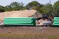 green plastic tubes on a construction site Royalty Free Stock Photo