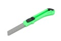 Green plastic utility knife, isolated Royalty Free Stock Photo
