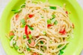 Green plate with pasta salad Royalty Free Stock Photo