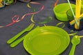 Green plates on the prepared table to celebrate a birthday Royalty Free Stock Photo