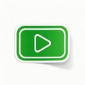 Green play button sticker graphic for digital content and media playback Royalty Free Stock Photo