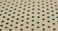 Green Polka Dots on Tan CloseUp Texture and Pattern, Modern Textile Design, Abstract Surface, Repetitive Motif Background Royalty Free Stock Photo