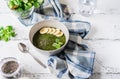 Green porridge in bawl with main ingredients: chia seeds, green, water Royalty Free Stock Photo