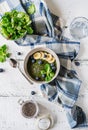 Green porridge in bawl with main ingredients: chia seeds, green, water Royalty Free Stock Photo