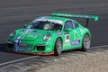 Green Porsche 991 in action