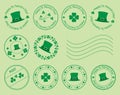 Green postage stamps with clovers and hat for saint patrick day Royalty Free Stock Photo