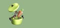 Green pot and lid with vegetable or food 3d render isolate background.