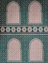 Green prayer mat on the mosque