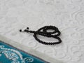 Green prayer rug and rosary. green prayer rug and ramadan month Royalty Free Stock Photo