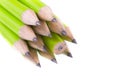 Green prepared pencils on white isolated background