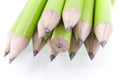 Green prepared pencils on white isolated background