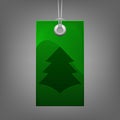 Green price tag with Christmas tree